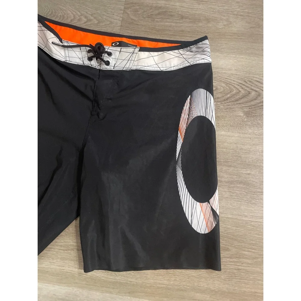 Oakley Geo Ellipse 18 Boardshorts Mens 33 Black Orange 482446-02E Surf Swim